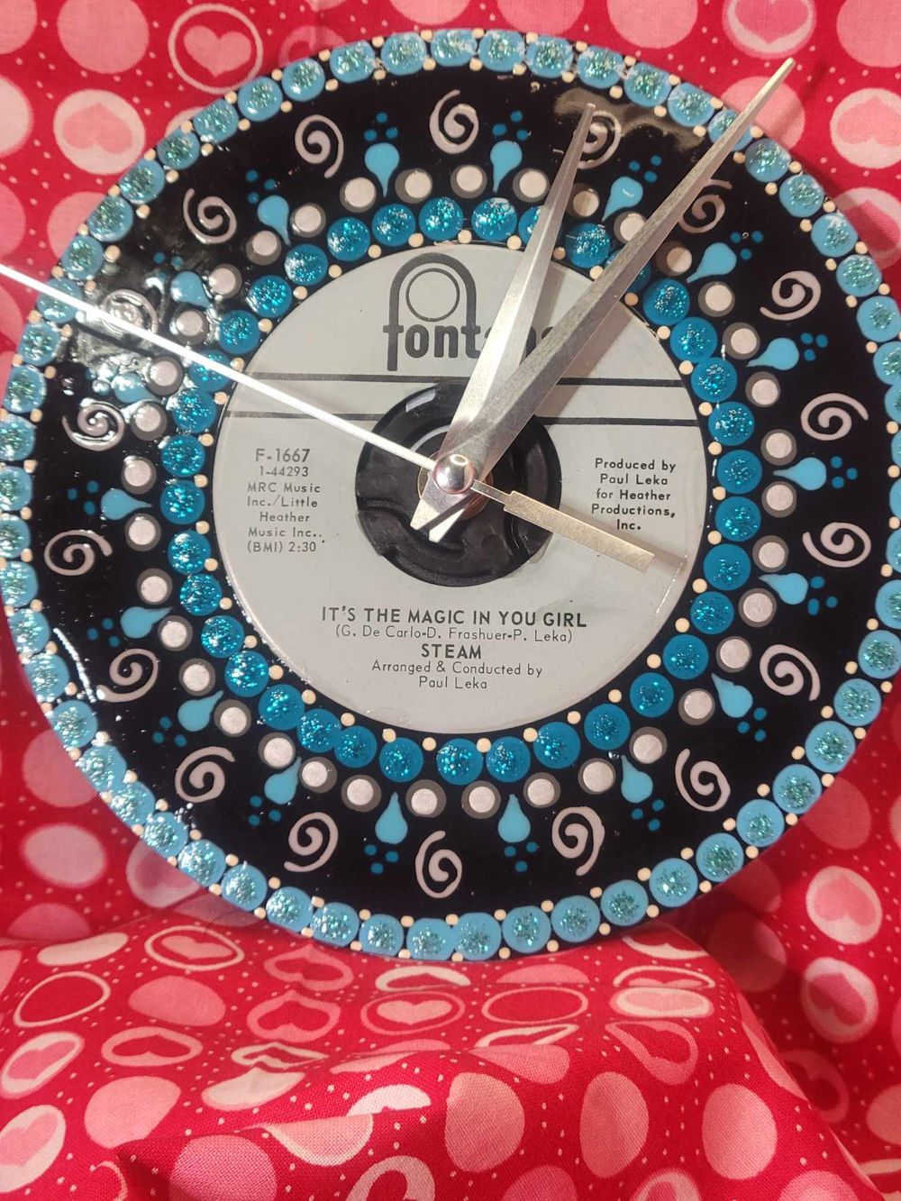 Painted 45rpm clock ("It's the magic in you girl")