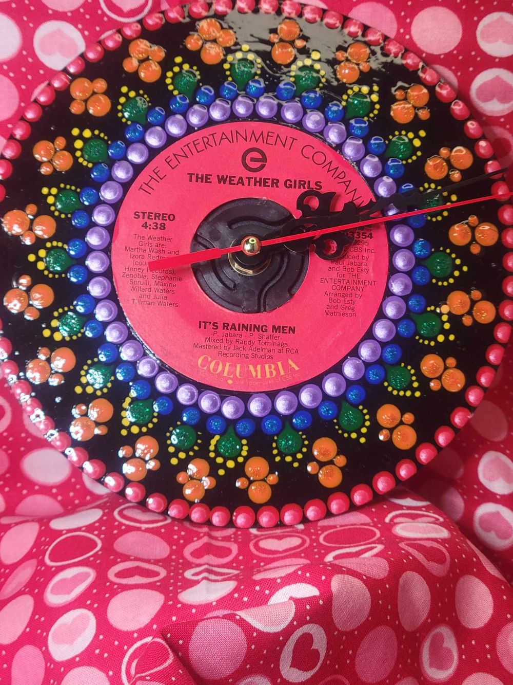 Hand painted 45rpm clock  ("It's raining men")